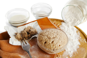 Rising yeast in a bowl for baking.