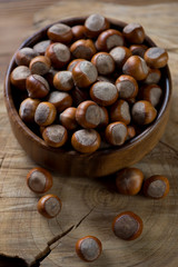 Cobnuts in a wooden bowl, close-up, selective focus