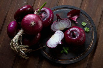 Still life with red onion, high angle view, studio shot