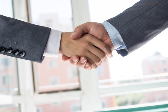 business people handshaking