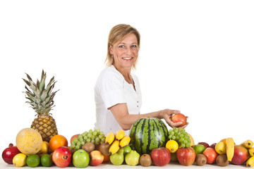 Fruits and blond cute woman