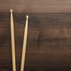 wooden drumsticks on wooden table