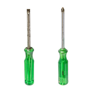 Old rust screwdriver with green handle isolated on white background