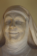 Nun stone face
