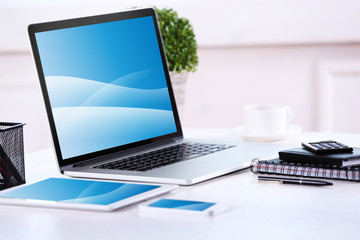 Modern workplace with laptop, close up
