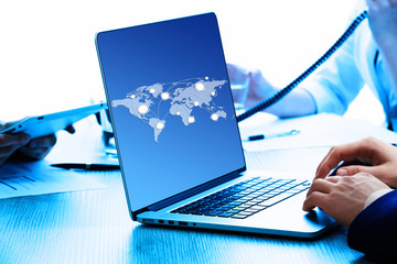 Laptop with chart and graphs on screen,  technology concept