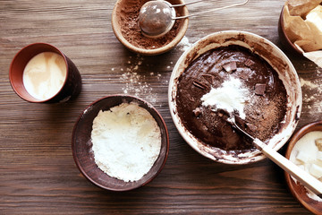 Obraz na płótnie Canvas Preparing dough for chocolate pie on table close up