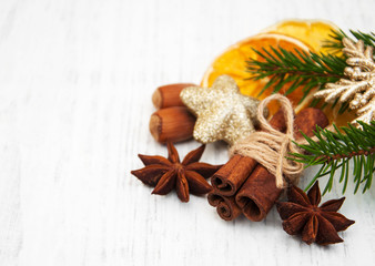 different kinds of spices,  nuts and dried oranges