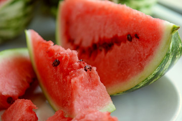 Sliced watermelon on plate closeup