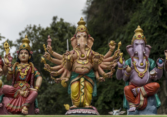 Fototapeta na wymiar Hindu gods at the Batu Caves temple in Kuala Lumpur, Malaysia