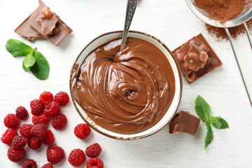 Beautiful composition with chocolate cream and raspberries