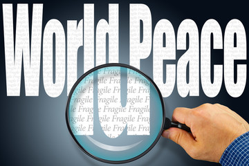 The words WORLD PEACE under observation with magnifying glass