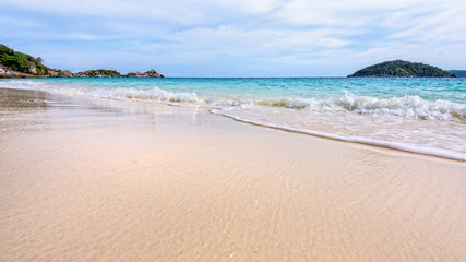 Beautiful landscape blue sea white sand and waves on the beach during summer at Koh Miang island in Mu Ko Similan National Park, Phang Nga province, Thailand, 16:9 widescreen