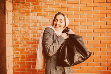 girl in a coat on the street