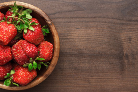strawberries on the wooden table