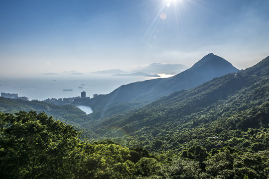 The view south of Hong Kong island, across a lush, tropical hillside