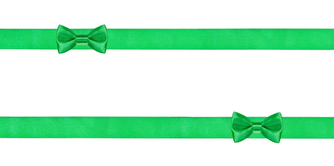 two green bow knots on two parallel silk ribbons