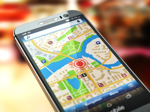 Mobile GPS navigation concept. Smartphone with city map on the s