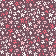 Floral seamless pattern with little bright flowers on purple background