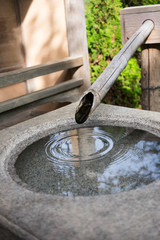 Japanese water basin with water ripples