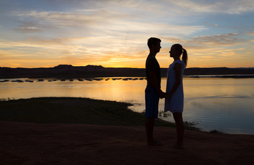 Fototapeta premium Loving Boy and Girl at Dusk