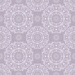 Vintage seamless pattern with elegant ornaments on violet background
