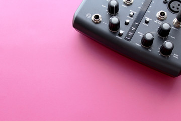 Audio interface for recording or mixing - sound/audio card - music making on pink background