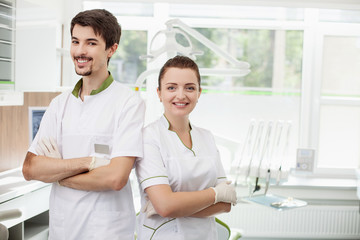 Professional young dentists are working in lab