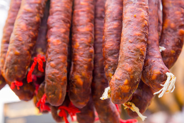 Catalan dry sausages called fuet at Mercat de Sant Josep de la Boqueria market in Barcelona