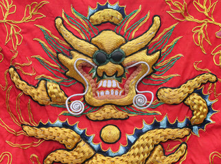 Tapestry of a Golden Dragon on a Red Silk Background