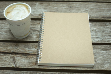 Vintage of Paper notebook on wood background,Selective focus
