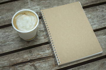 Vintage of Paper notebook on wood background,Selective focus