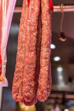 Catalan dry sausages called fuet at Mercat de Sant Josep de la Boqueria market in Barcelona