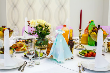 Wedding festive table, a white tablecloth served, cold appetizer, Serving in the restaurant.
