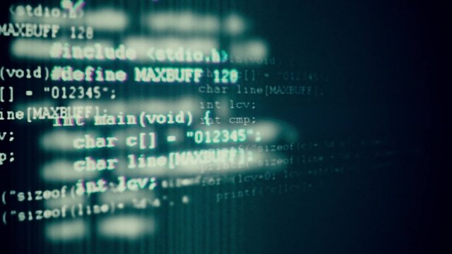  Programming code running down a computer screen terminal