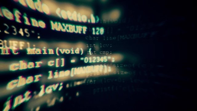  Programming code running down a computer screen terminal