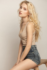 Studio portrait of a beautiful young blond woman