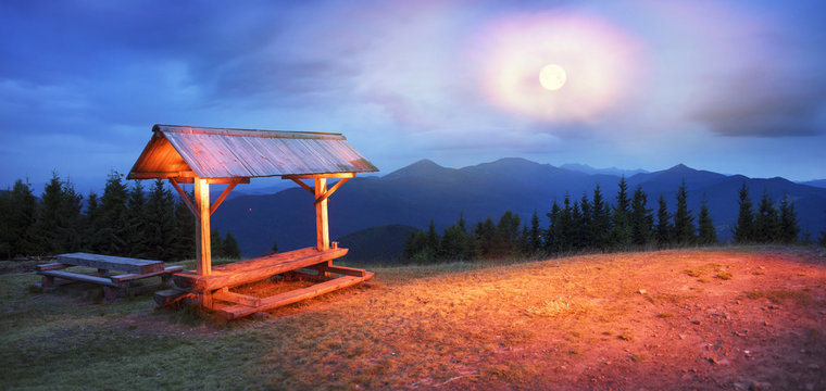 Bench and night on the mountain