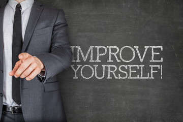 Improve yourself on blackboard with businessman