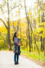 Obraz premium Woman walking happy in a park