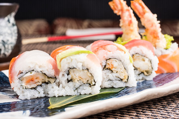delicious sushi rolls on a plate in a japanese restaurant