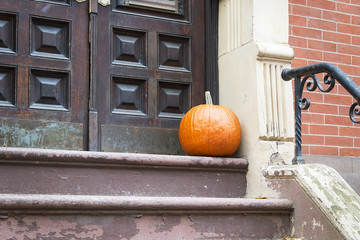 Halloween pumpkin near the door