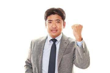 ガッツポーズのビジネスマン