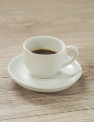  Cup of coffee on wooden table