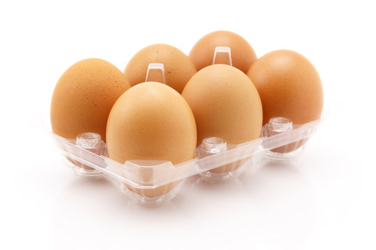 Six eggs isolated on white background