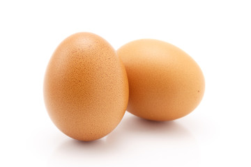Two eggs isolated on white background