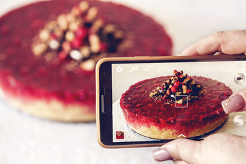 Biscuits cheesecake with raspberries and wafer sticks