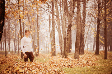 young men in autumn park