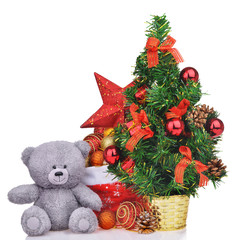 composition with teddy bear christmas tree and santa claus bag