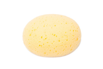 round yellow natural facial cellulose sponge isolated on white b